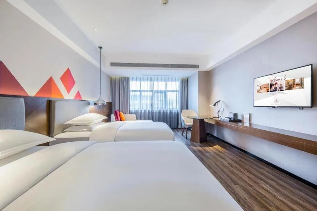 Bed in Borrman Hotel Nanning Railway Station