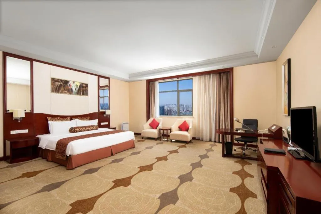 Bed in Longqi Jianguo Hotel Kunshan