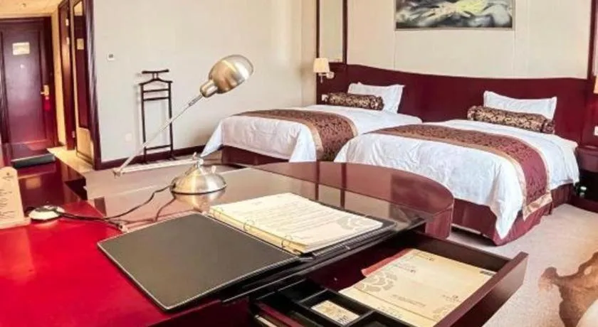 Bed in Longqi Jianguo Hotel Kunshan