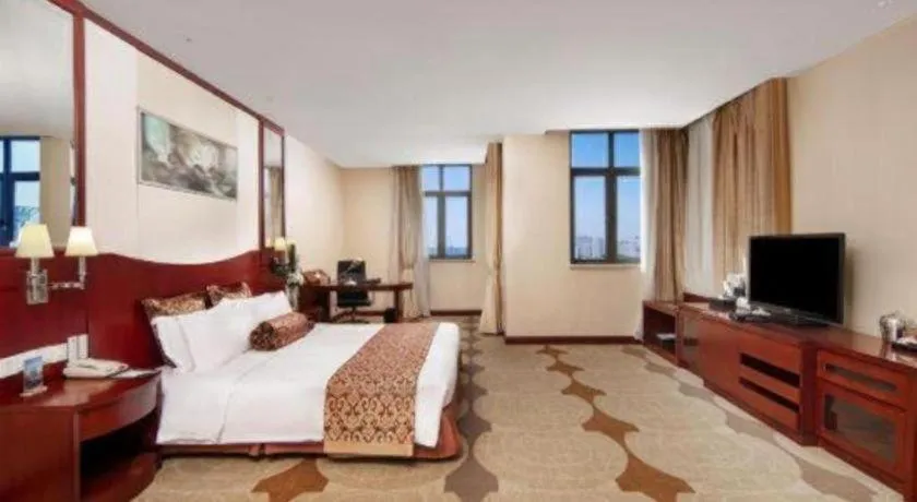 Bed in Longqi Jianguo Hotel Kunshan