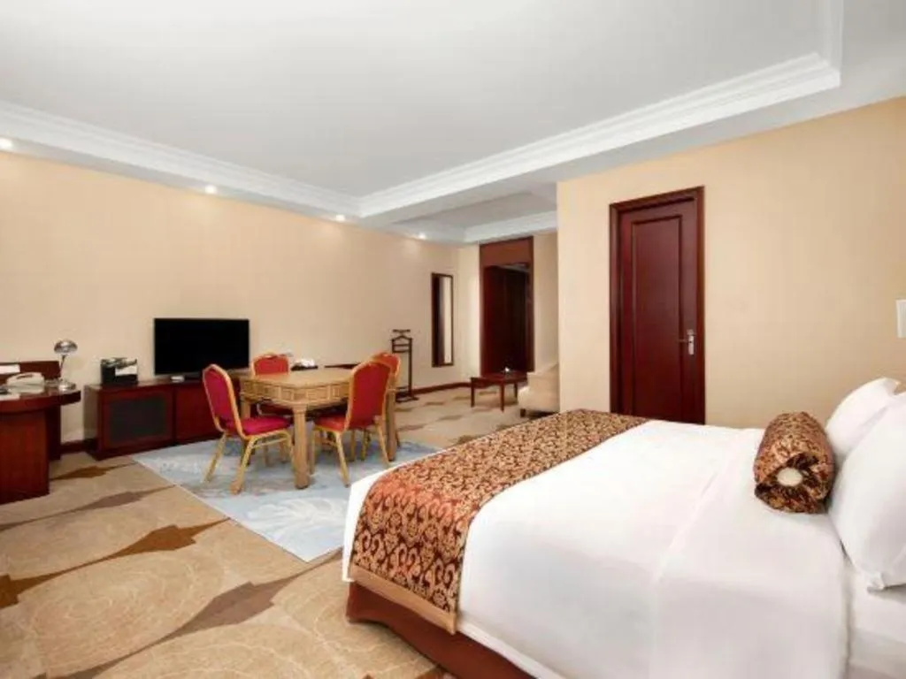 Bed in Longqi Jianguo Hotel Kunshan