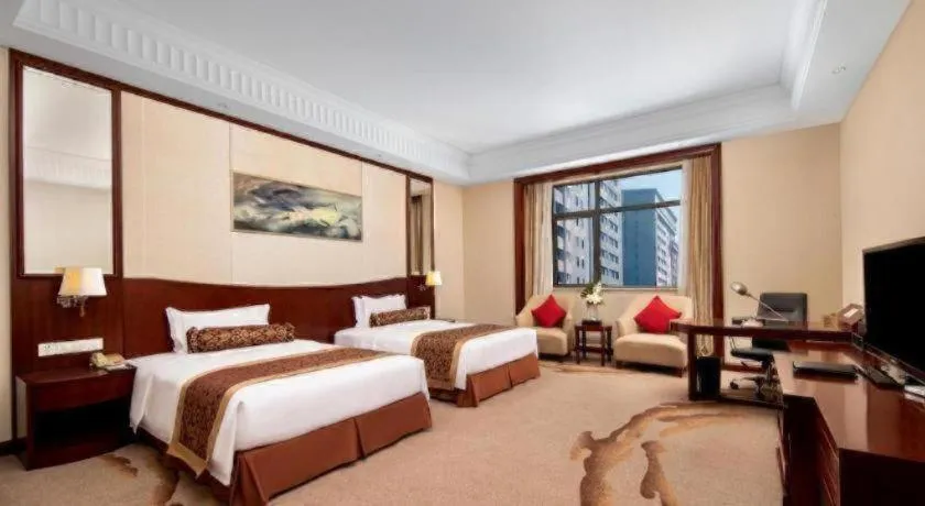 Bed in Longqi Jianguo Hotel Kunshan