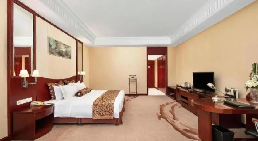 Bed in Longqi Jianguo Hotel Kunshan