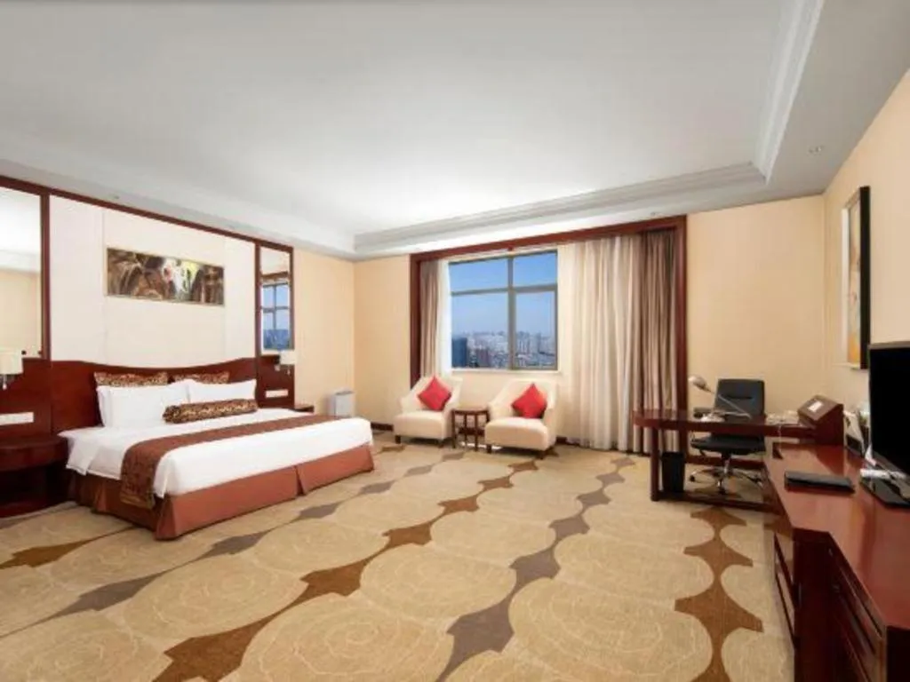 Bed in Longqi Jianguo Hotel Kunshan