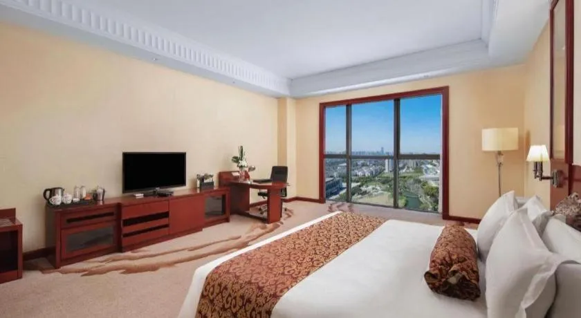 Bed in Longqi Jianguo Hotel Kunshan