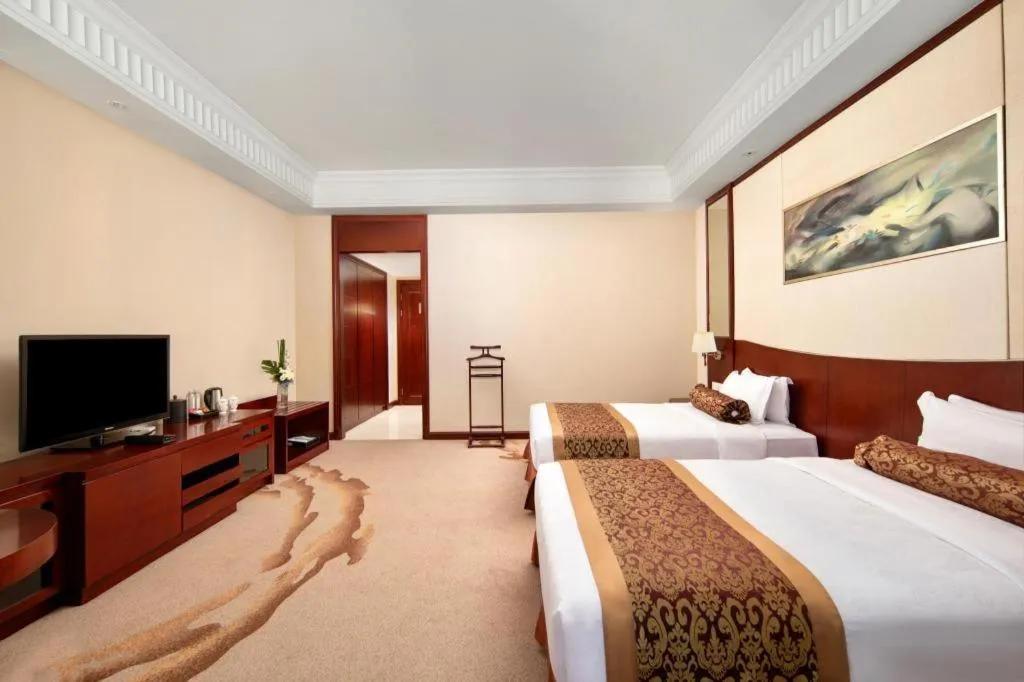 Bed in Longqi Jianguo Hotel Kunshan