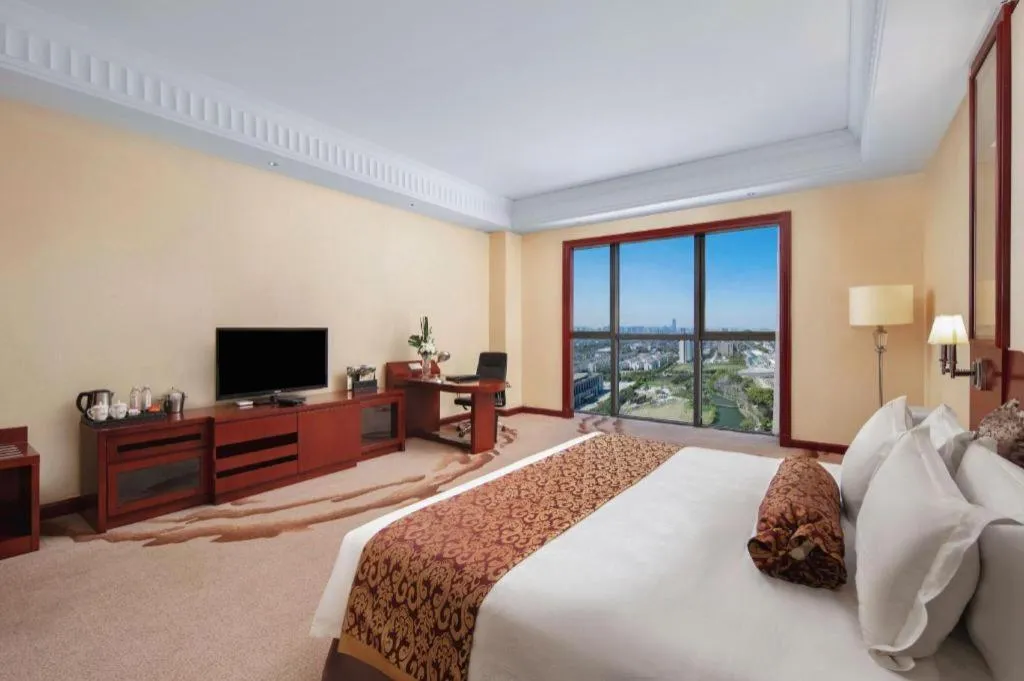 Bed in Longqi Jianguo Hotel Kunshan