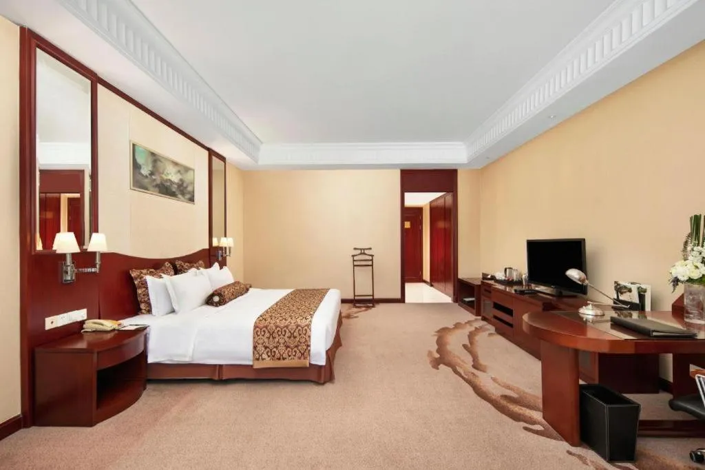 Bed in Longqi Jianguo Hotel Kunshan