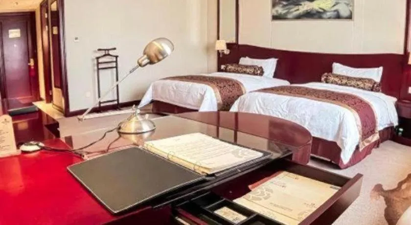 Bed in Longqi Jianguo Hotel Kunshan