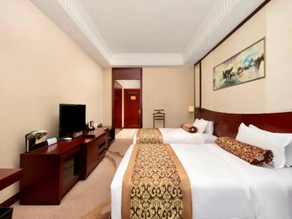 Bed in Longqi Jianguo Hotel Kunshan