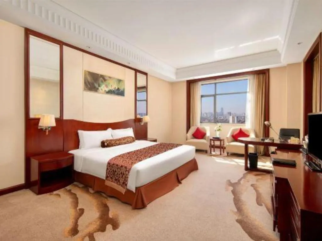 Bed in Longqi Jianguo Hotel Kunshan