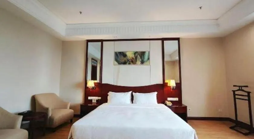 Bed in Longqi Jianguo Hotel Kunshan