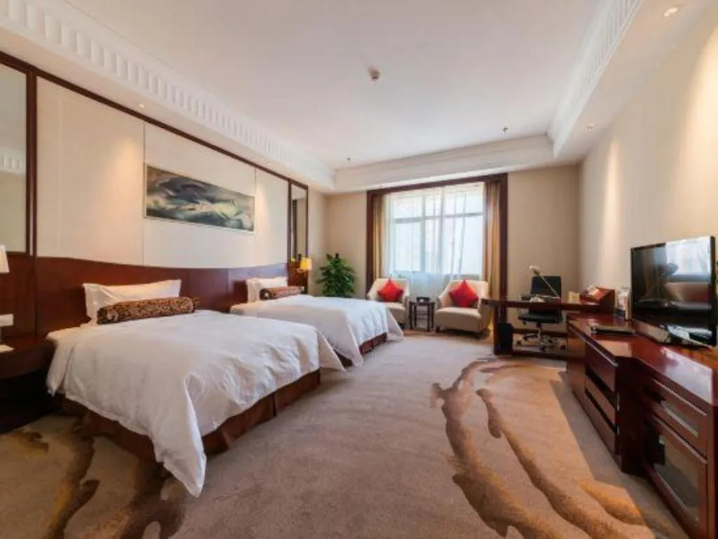 Bed in Longqi Jianguo Hotel Kunshan