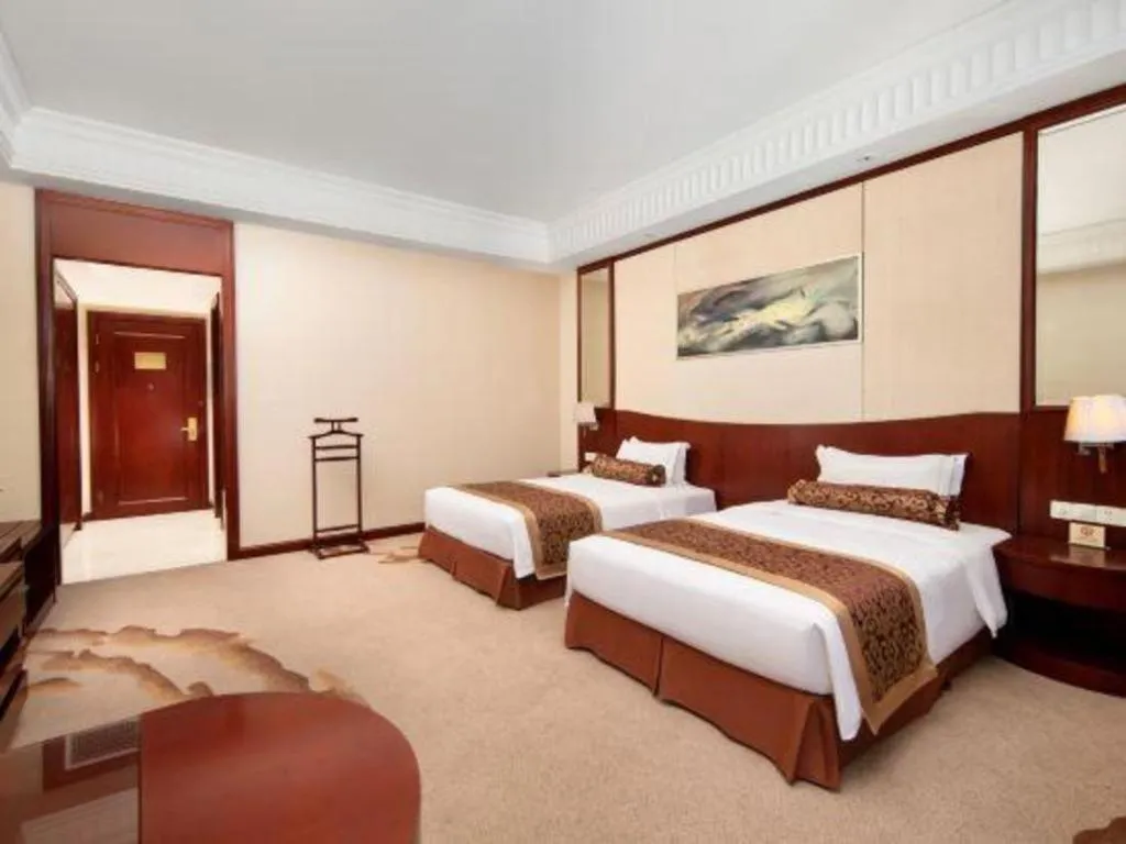 Bed in Longqi Jianguo Hotel Kunshan