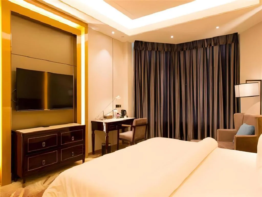 Bed in Metropolo Hotel Yining Development Zone Hanma Building