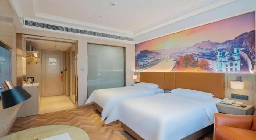 Bed in Vienna Hotel Shenzhen Longgang Baifucheng