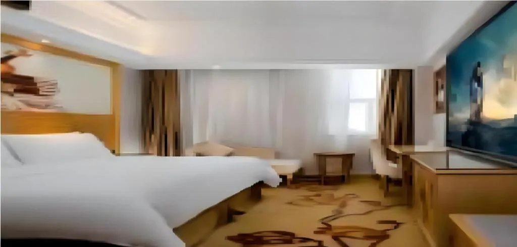 Bed in Vienna Hotel Shenzhen Longgang Baifucheng