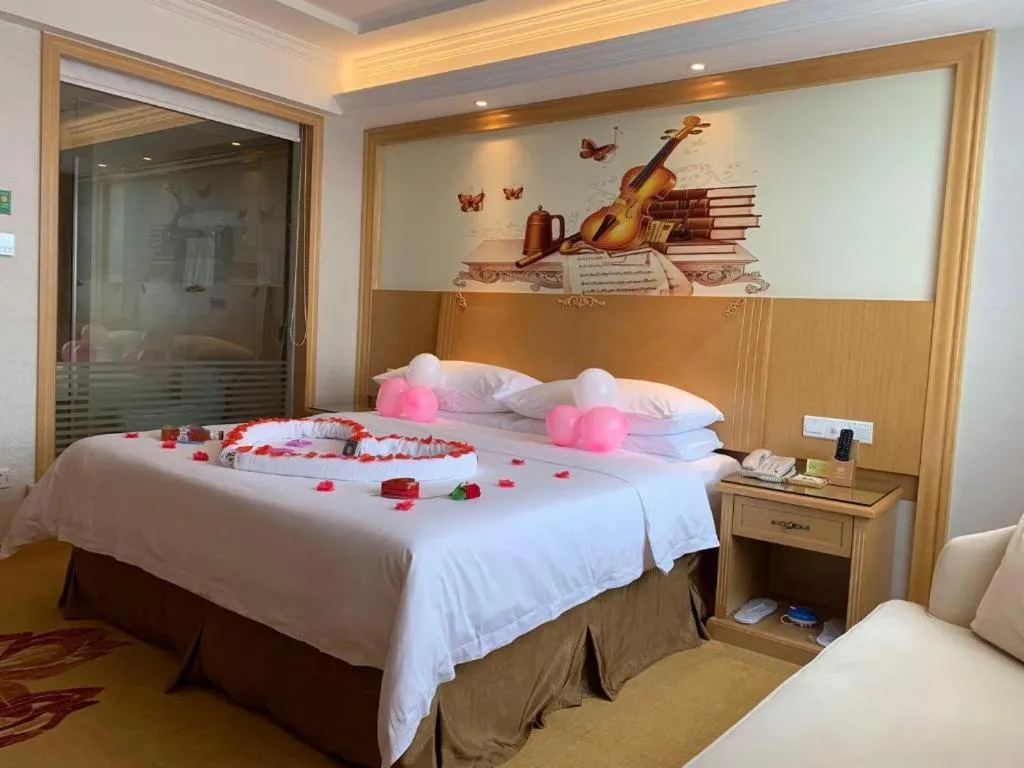 Bed in Vienna Hotel Shenzhen Longgang Baifucheng