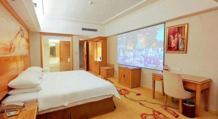 Bed in Vienna Hotel Shenzhen Longgang Baifucheng