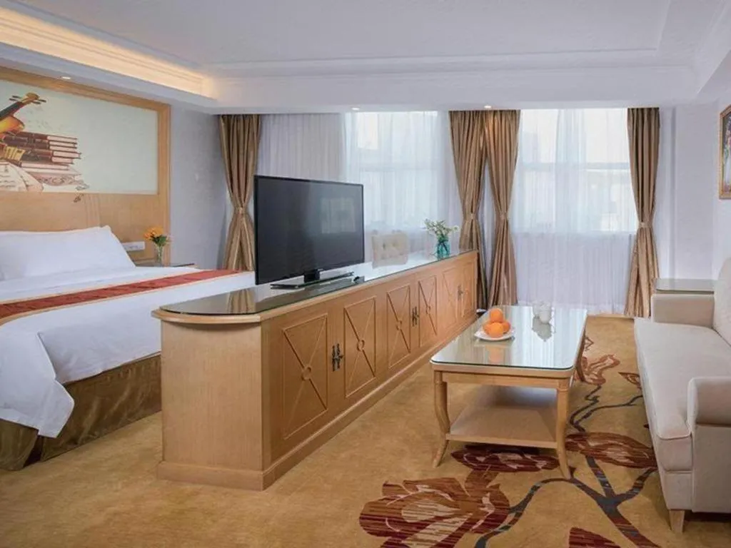 Bed in Vienna Hotel Shenzhen Longgang Baifucheng