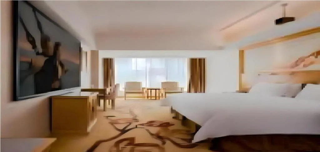 Bed in Vienna Hotel Shenzhen Longgang Baifucheng