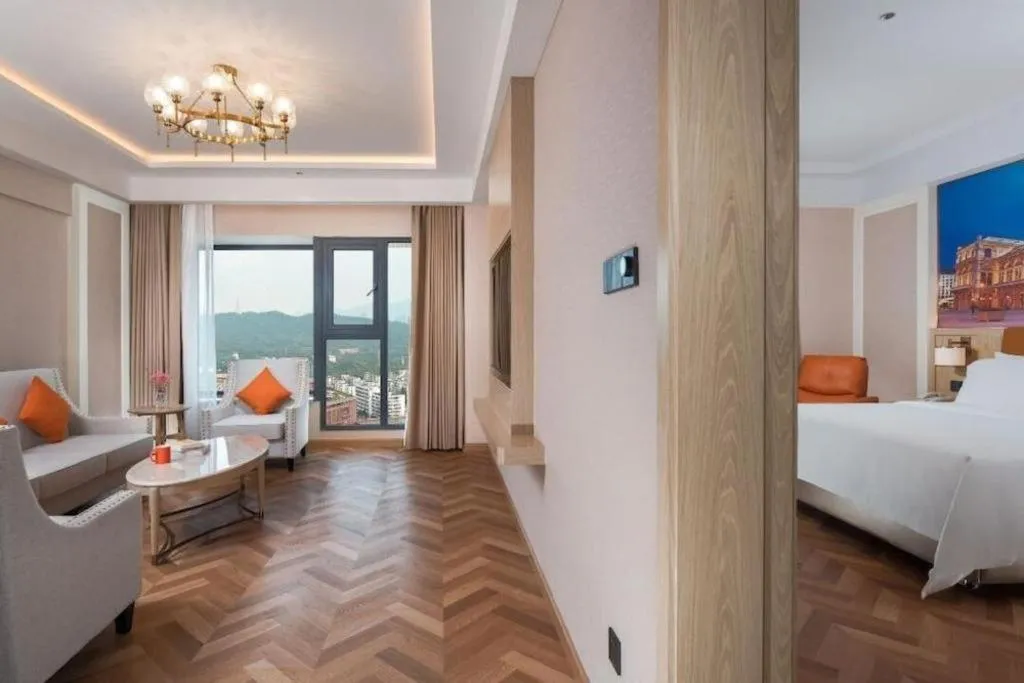 Bed in Vienna Hotel Shenzhen Longgang Baifucheng