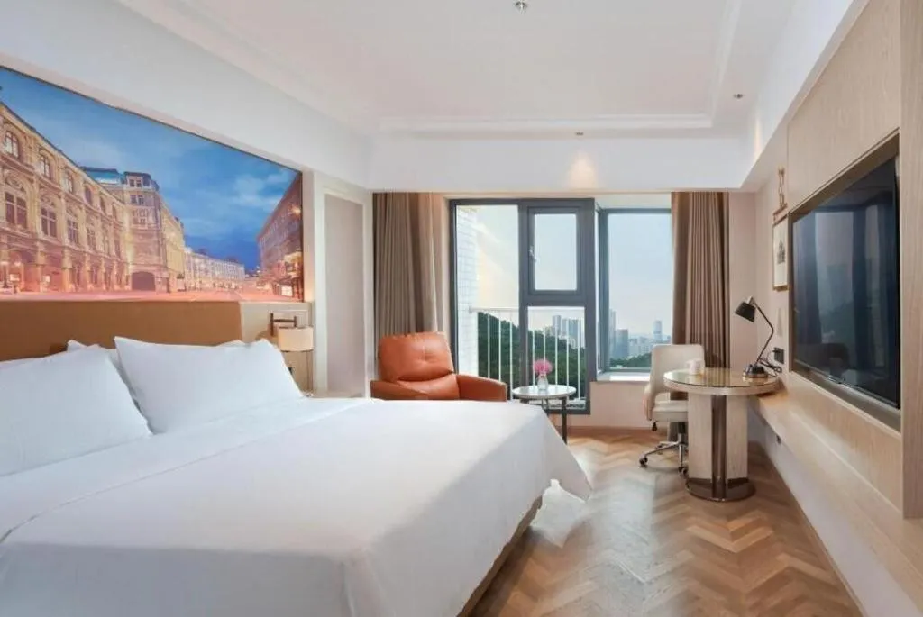 Bed in Vienna Hotel Shenzhen Longgang Baifucheng