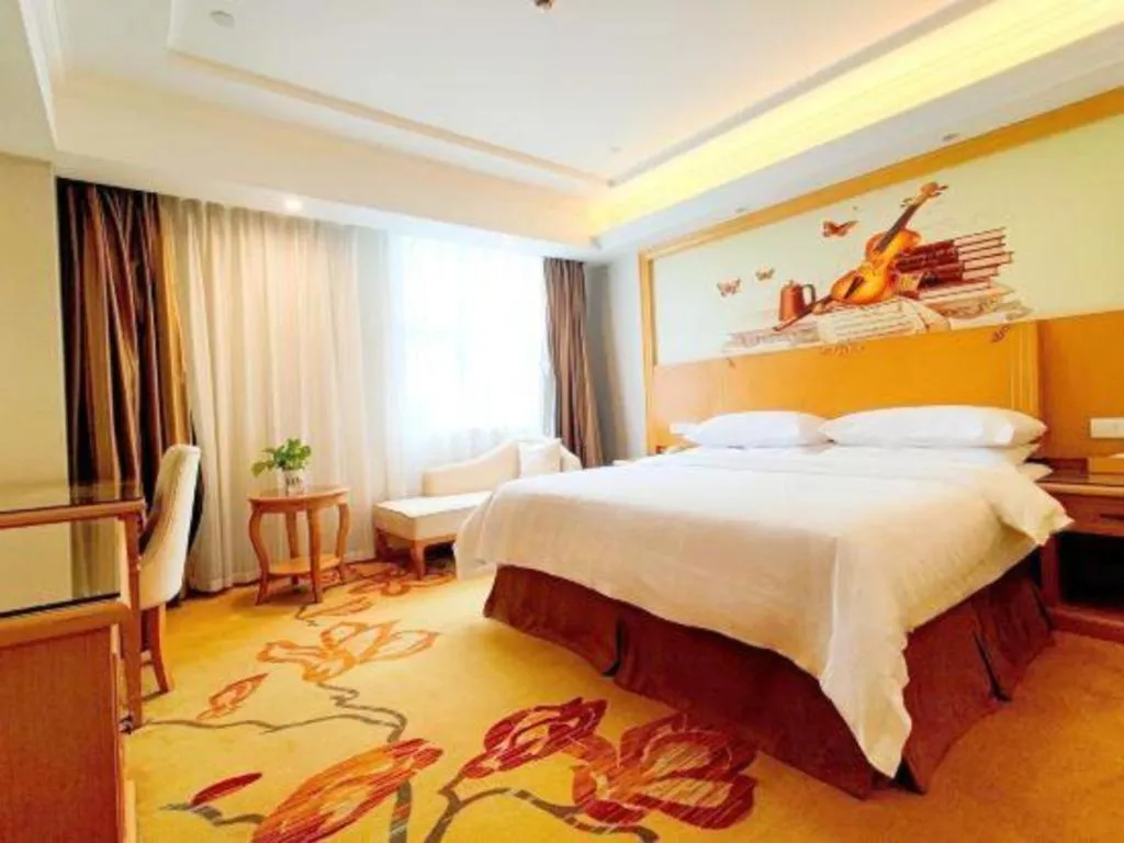 Bed in Vienna Hotel Shenzhen Longgang Baifucheng