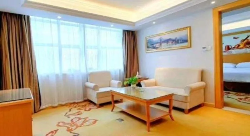 Bed in Vienna Hotel Shenzhen Longgang Baifucheng