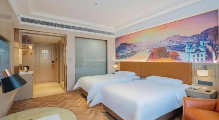 Bed in Vienna Hotel Shenzhen Longgang Baifucheng