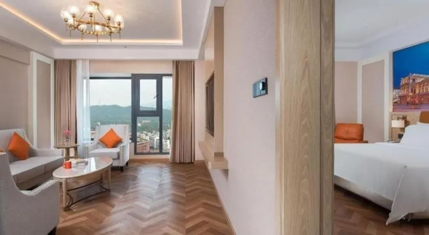Bed in Vienna Hotel Shenzhen Longgang Baifucheng