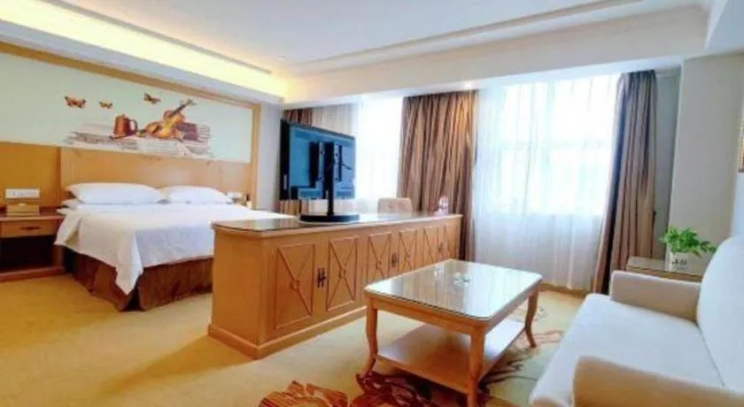 Bed in Vienna Hotel Shenzhen Longgang Baifucheng