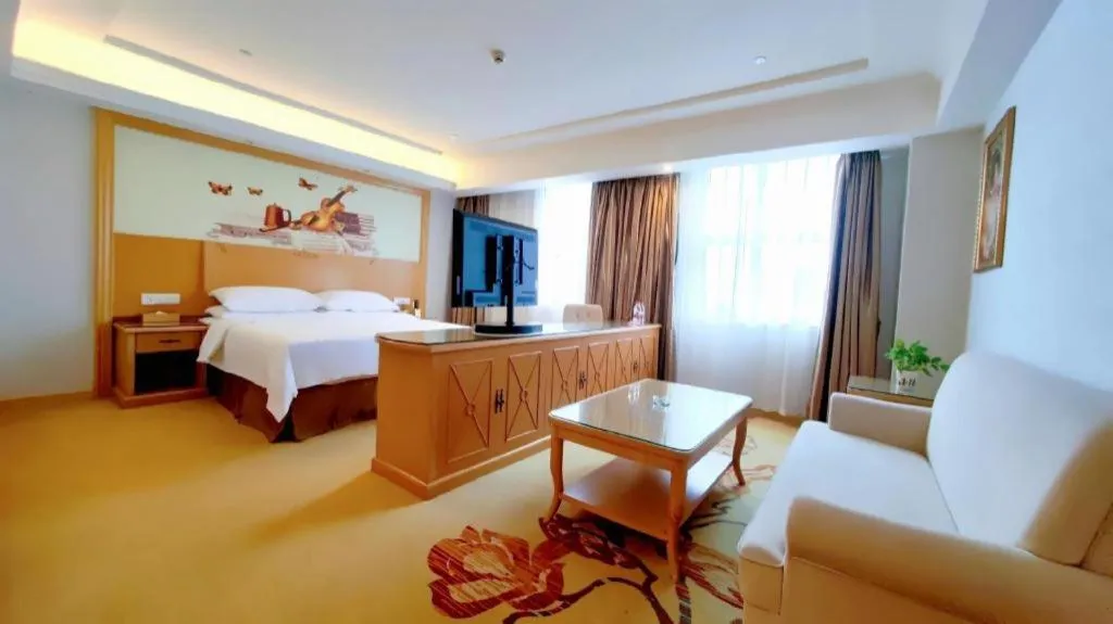 Bed in Vienna Hotel Shenzhen Longgang Baifucheng