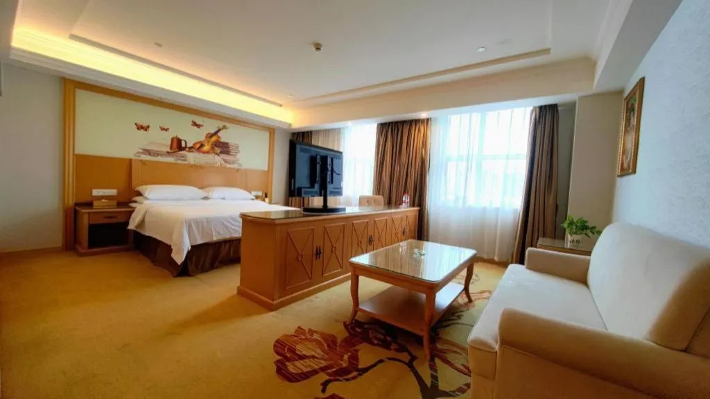 Bed in Vienna Hotel Shenzhen Longgang Baifucheng