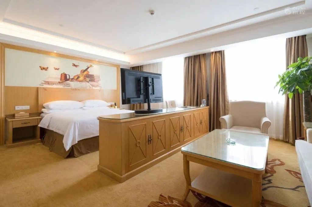 Bed in Vienna Hotel Shenzhen Longgang Baifucheng
