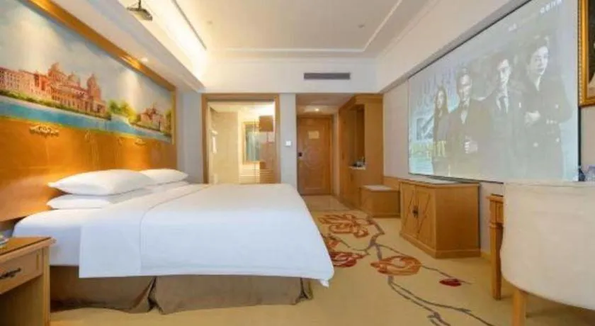 Bed in Vienna Hotel Shenzhen Longgang Baifucheng