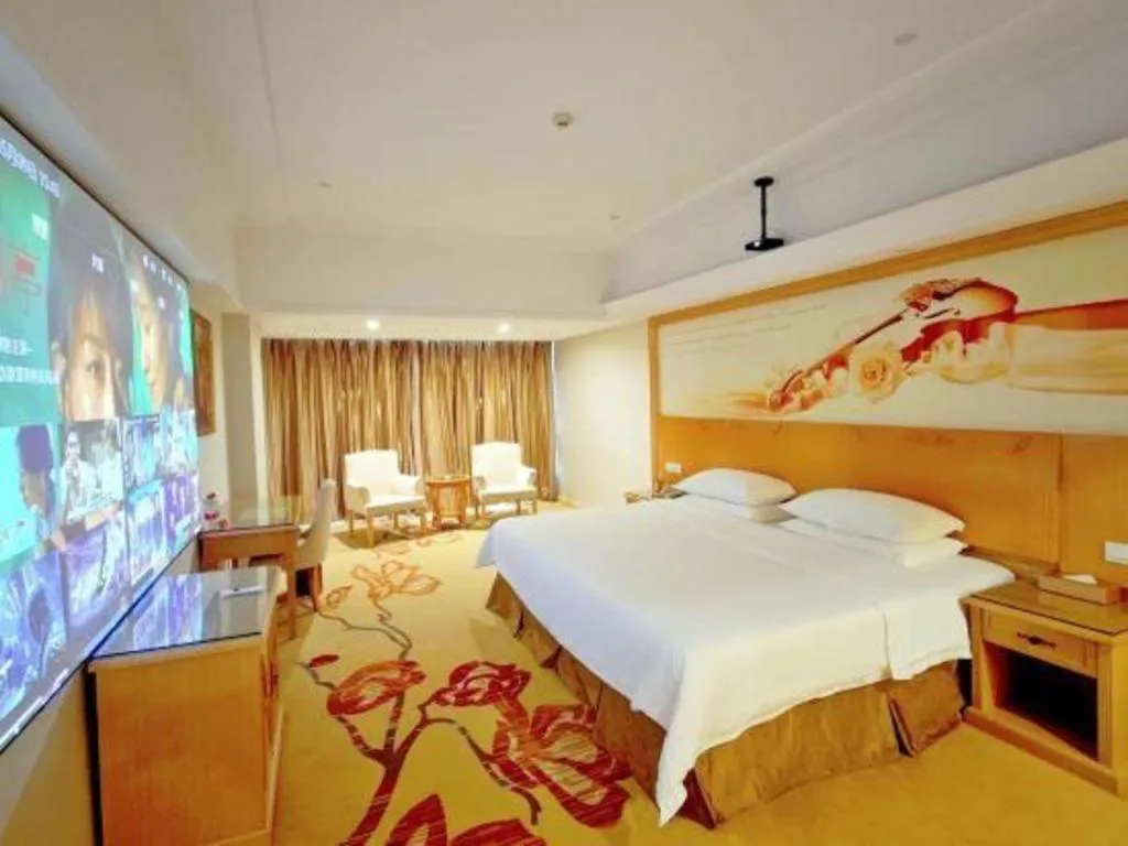 Bed in Vienna Hotel Shenzhen Longgang Baifucheng