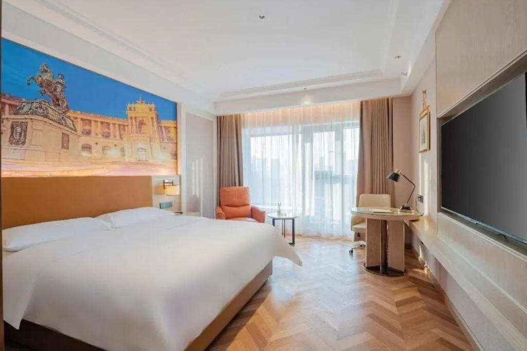 Bed in Vienna Hotel Shenzhen Longgang Baifucheng