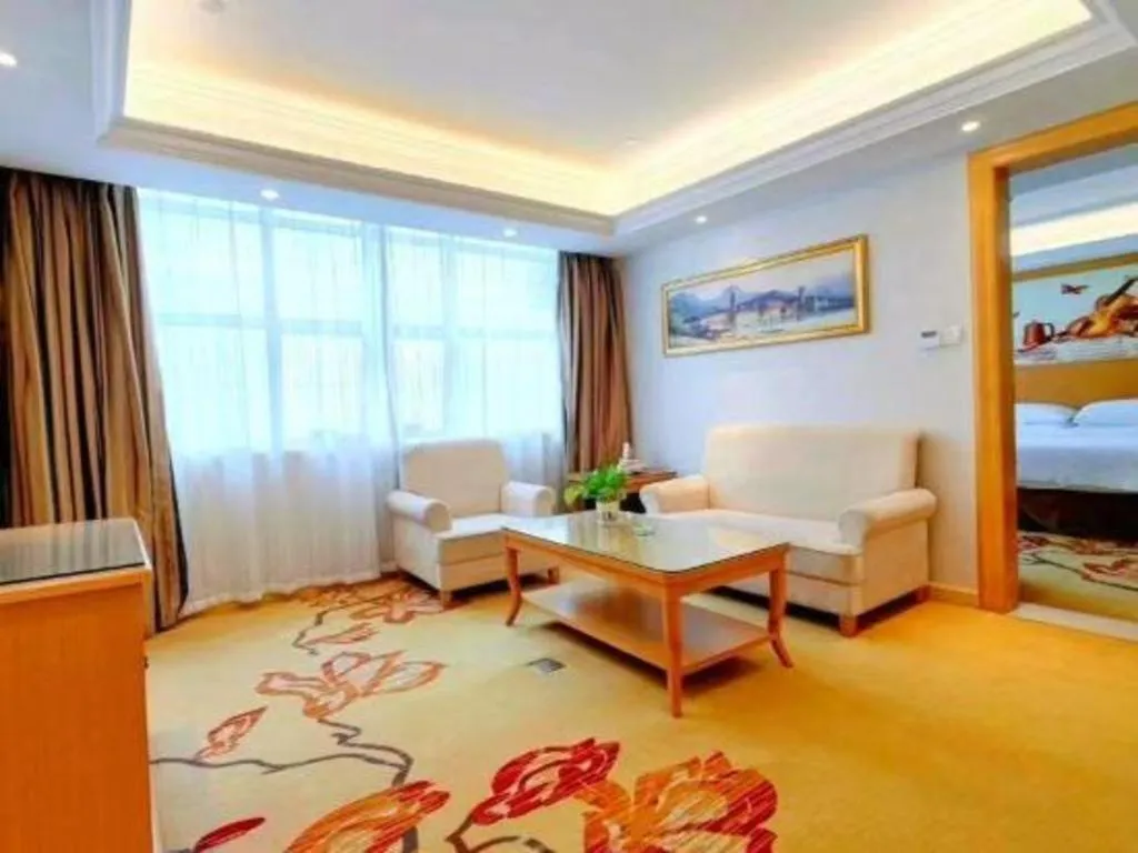 Bed in Vienna Hotel Shenzhen Longgang Baifucheng