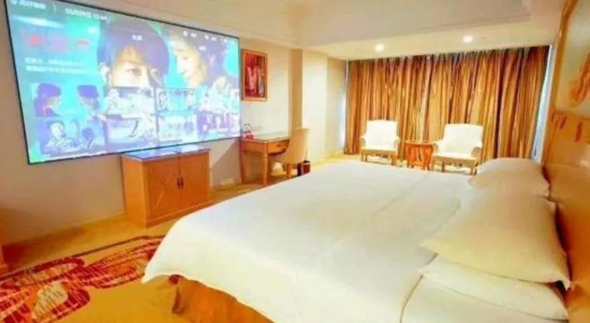 Bed in Vienna Hotel Shenzhen Longgang Baifucheng