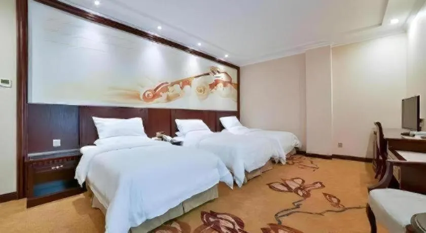 Bed in Vienna Classic Hotel Zhangzhou Longchi Center