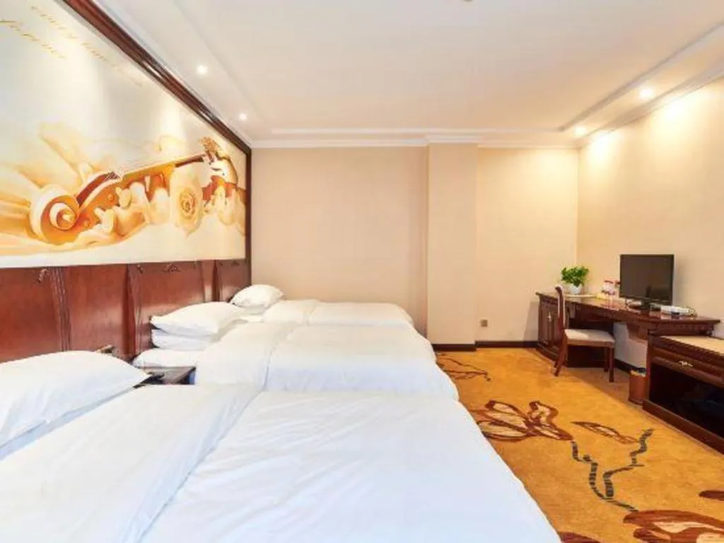 Bed in Vienna Classic Hotel Zhangzhou Longchi Center