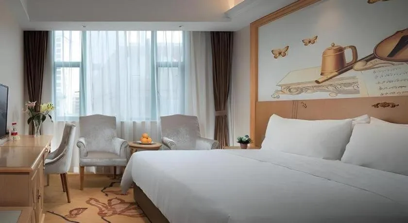 Bed in Vienna Classic Hotel Zhangzhou Longchi Center