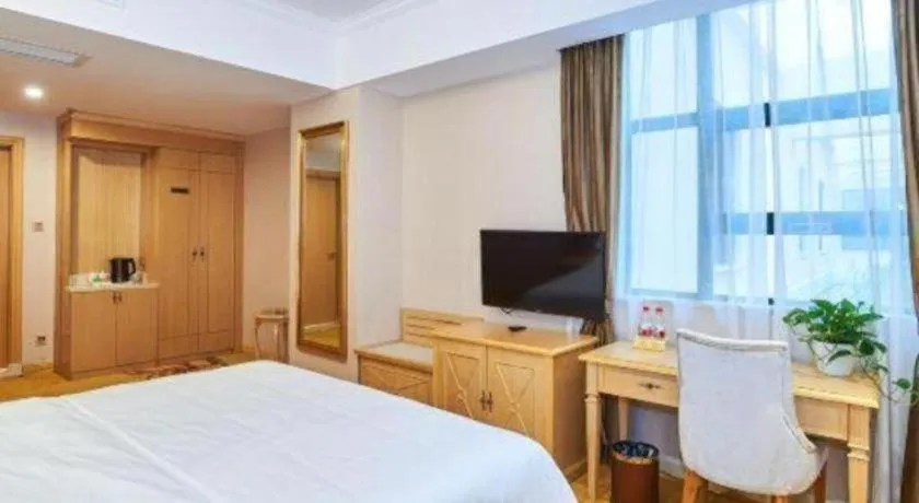 Bed in Vienna Classic Hotel Zhangzhou Longchi Center