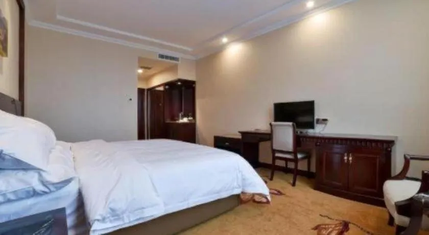 Bed in Vienna Classic Hotel Zhangzhou Longchi Center