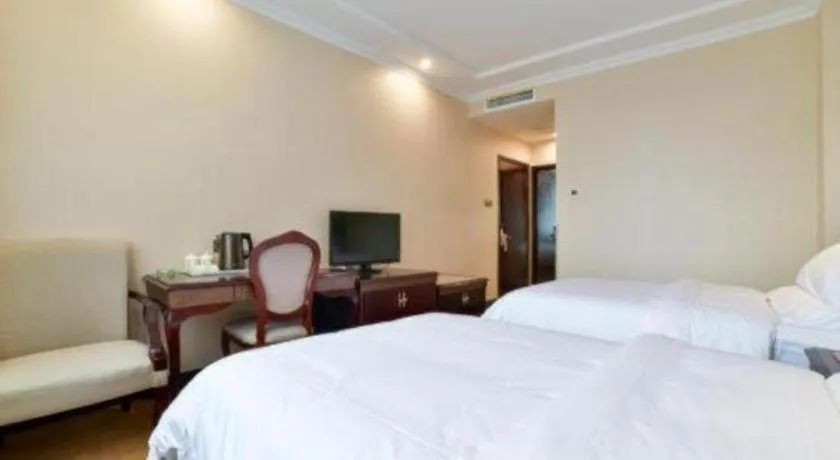 Bed in Vienna Classic Hotel Zhangzhou Longchi Center