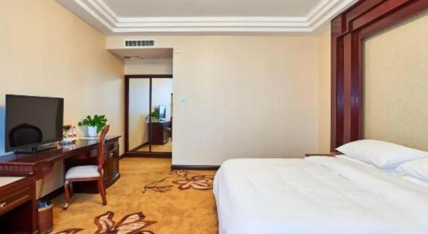 Bed in Vienna Classic Hotel Zhangzhou Longchi Center