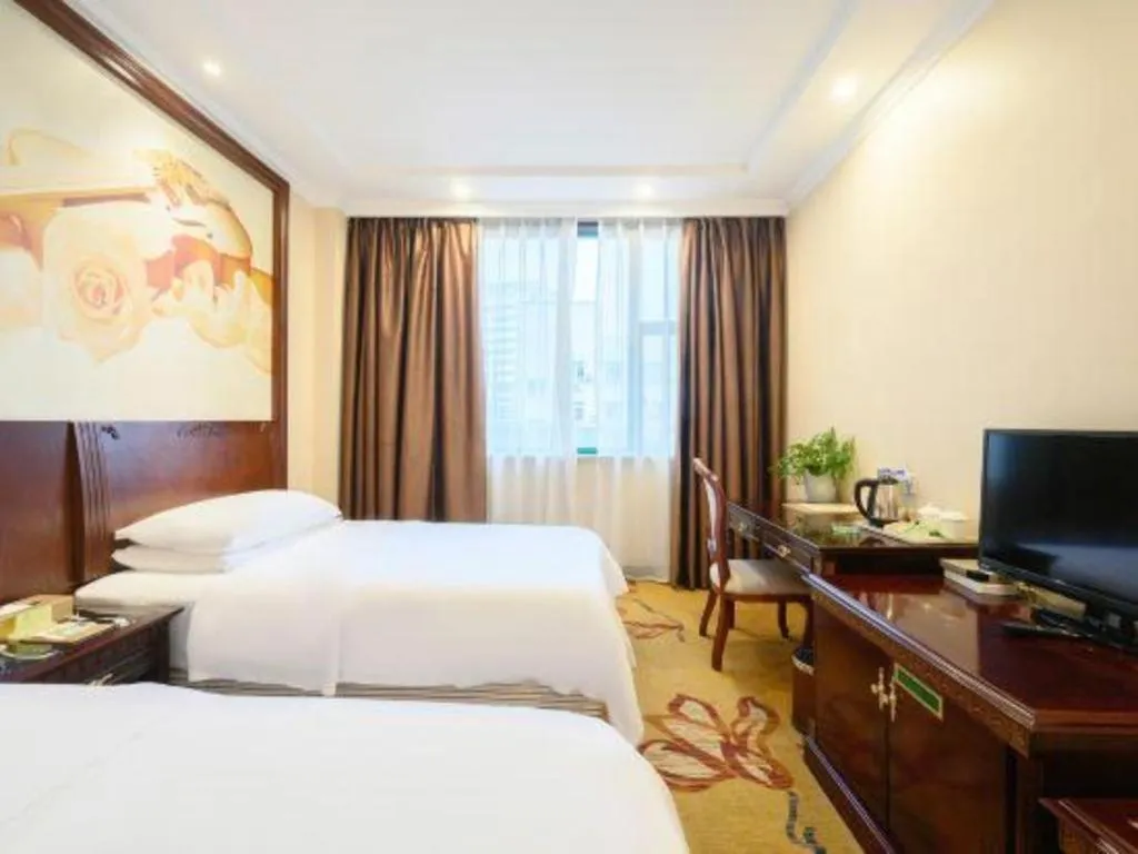 Bed in Vienna Classic Hotel Zhangzhou Longchi Center