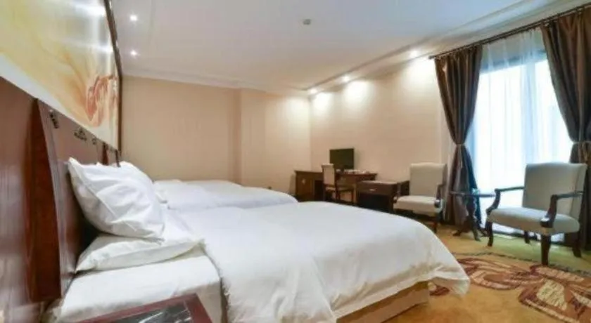 Bed in Vienna Classic Hotel Zhangzhou Longchi Center