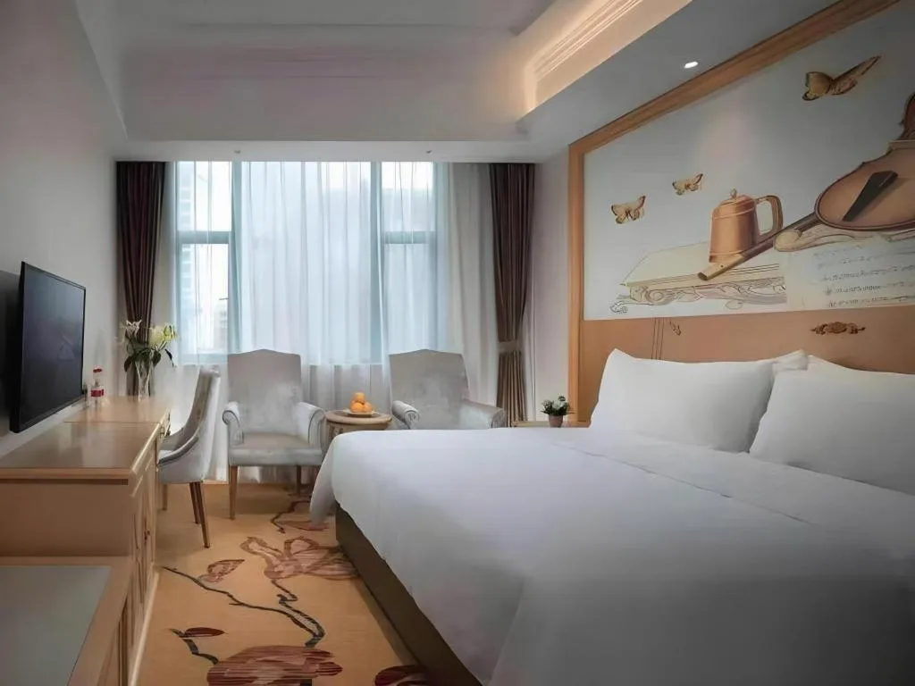 Bed in Vienna Classic Hotel Zhangzhou Longchi Center